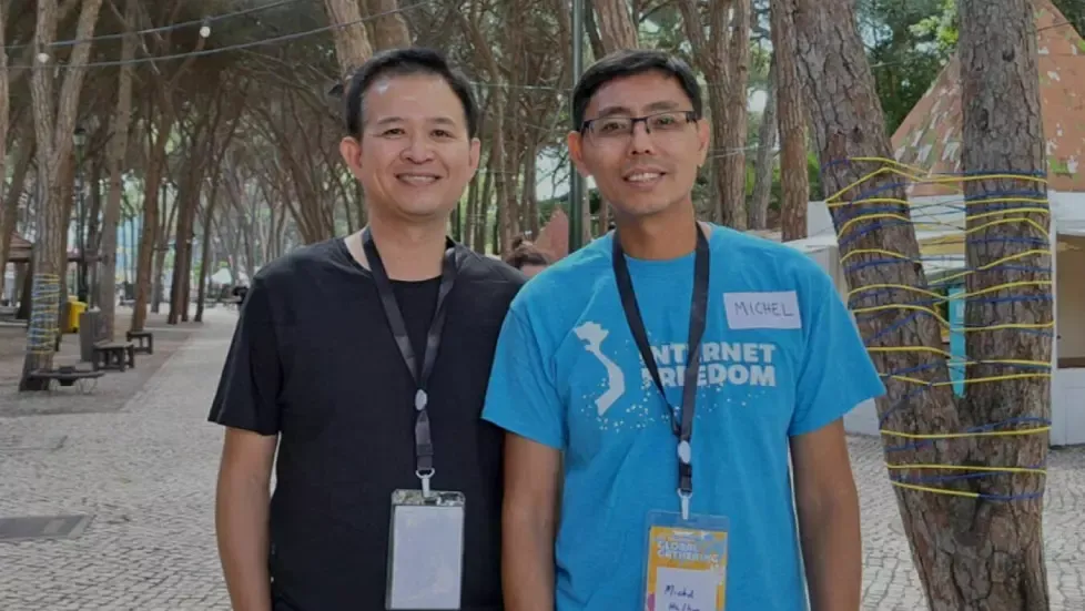 ACTIVIST: Thuan Duc Nguyen (left) pictured in Portugal in 2023. Photo: Private